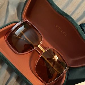 Gucci women”s oversized GG 0903S Sunglasses (Gold/Pink)